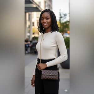 2011 authentic Louis Vuitton Sarah wallet in Damier Ebene with crossbody kit